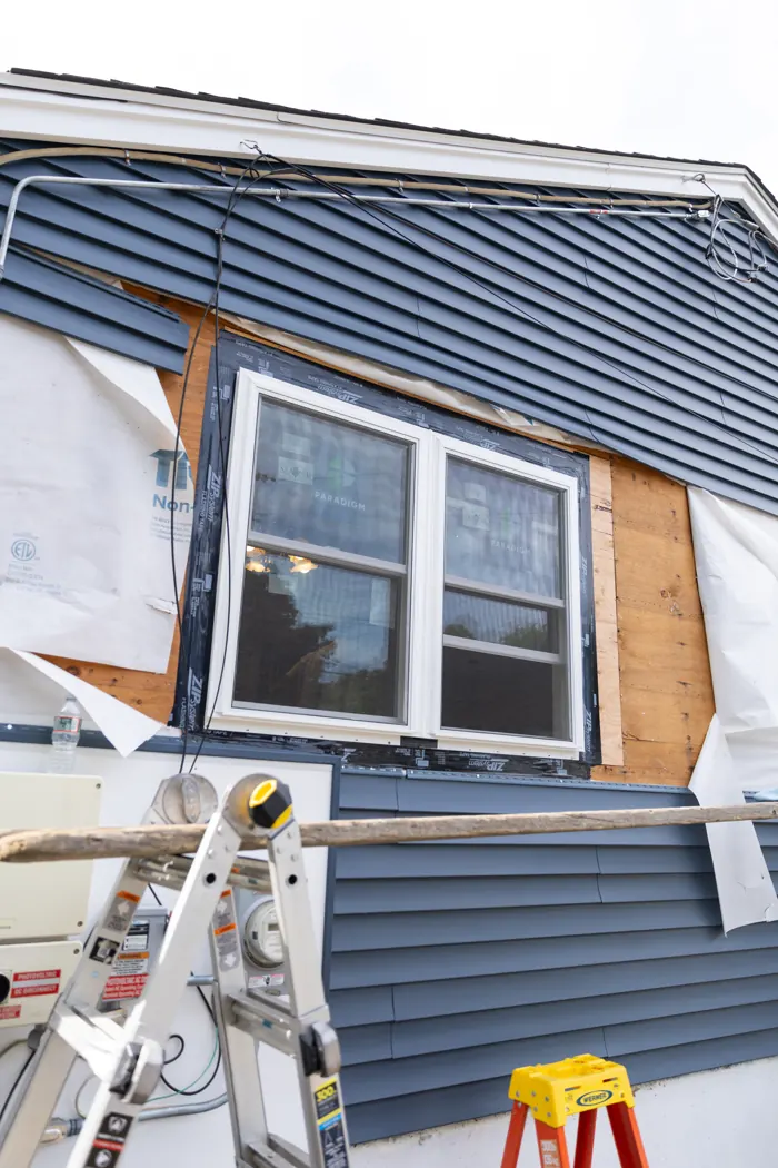 Window trim and siding in progress
